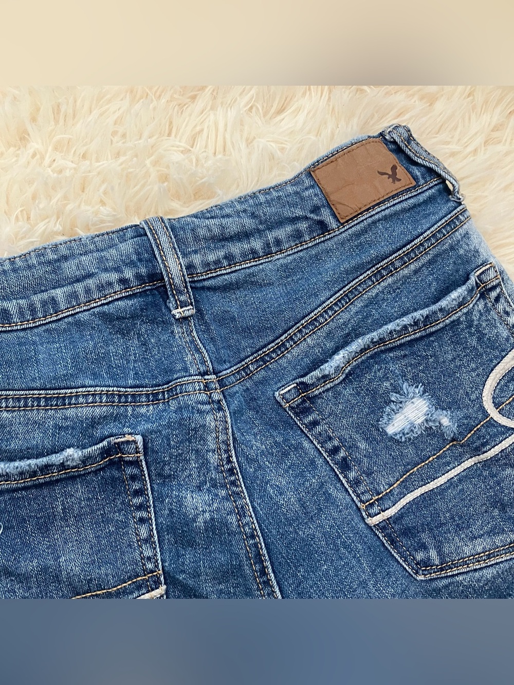 American Eagle Denim Distressed Mid Rise Mini Shorts - Picture 4 of 10